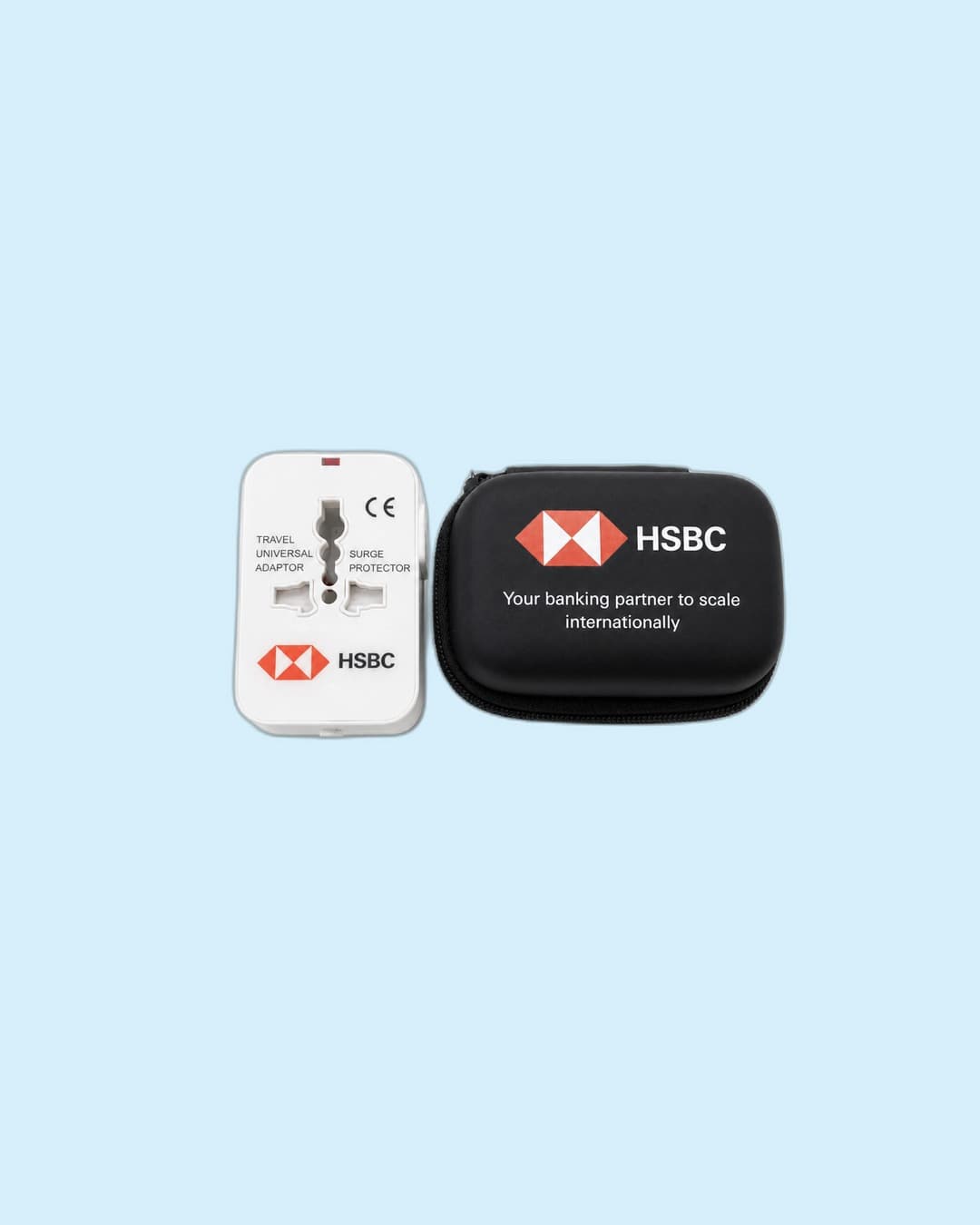 HSBC — Universal travel adapter with surge protector and zip case