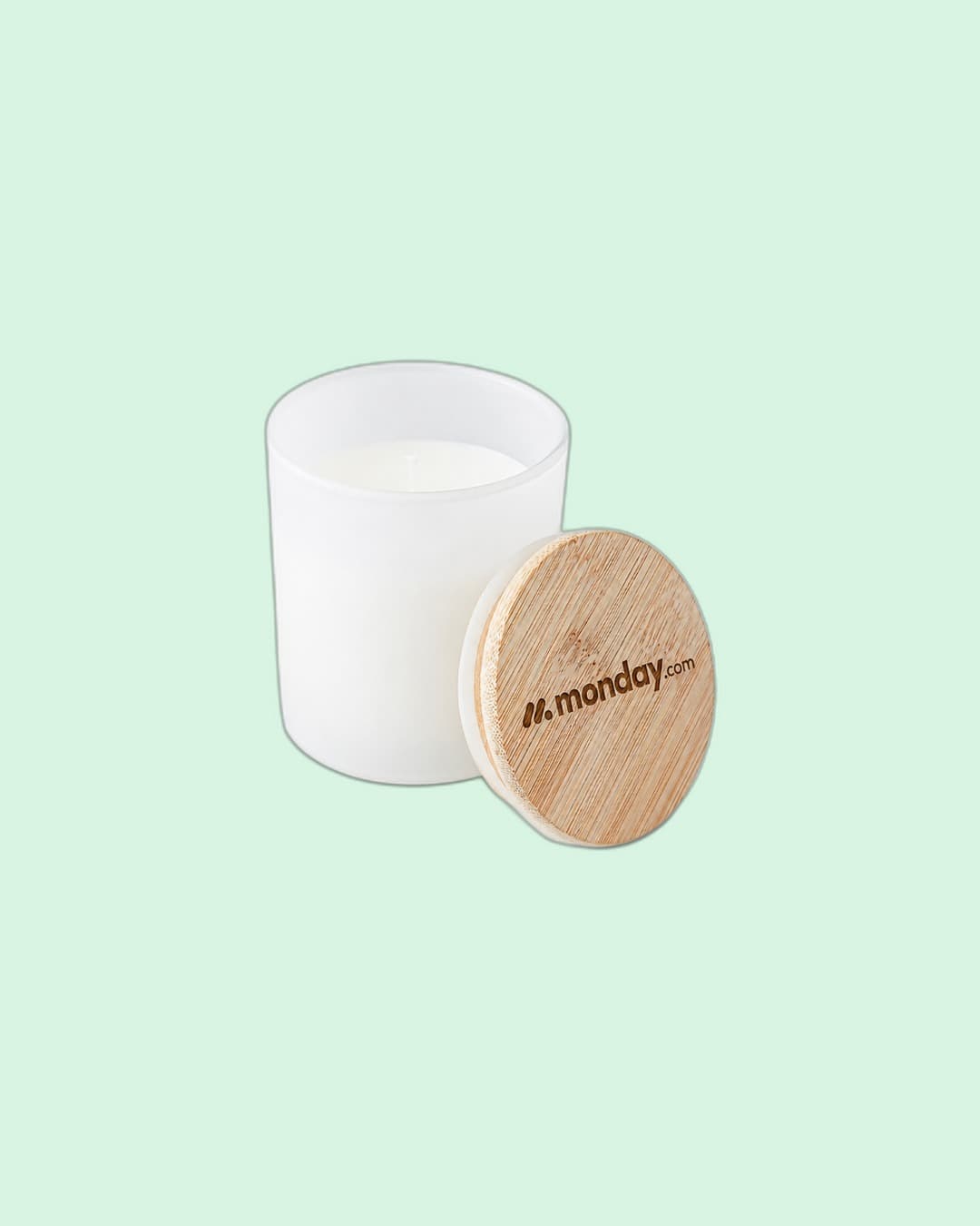 monday.com — Frosted-glass candle with engraved monday.com wooden lid